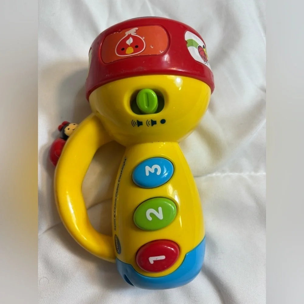 VTECH Spin & Learn 6” Color Flashlight with Sounds and Lights
